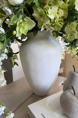Bucida, Hellebores, Ranunuculus and Hydrangea in a White Matt Vase Rtfact Flowers 