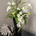 Calla Lily,Eremurus and Ranunculus in an Asymmetric Ribbed Vase RTFact Flowers 