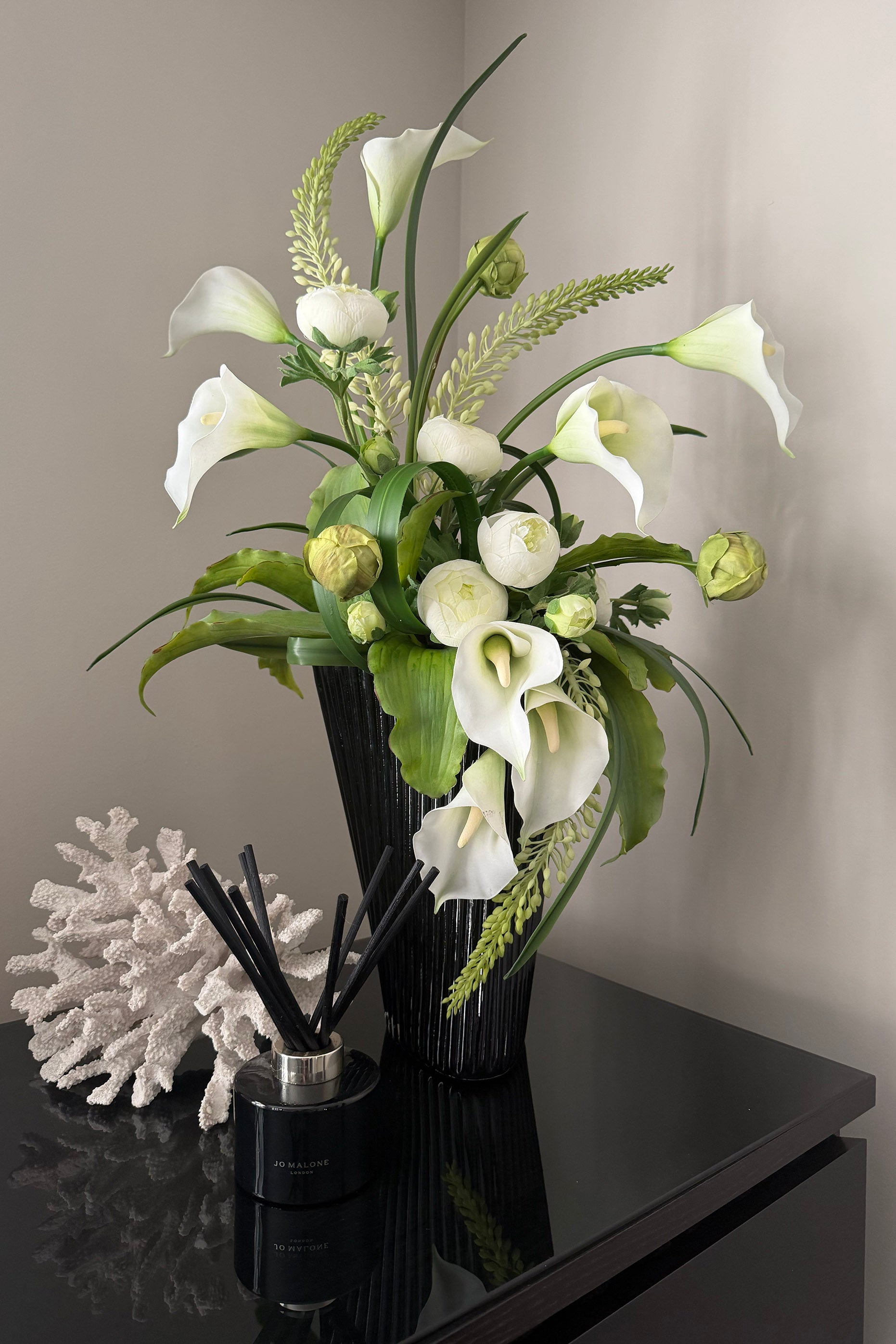 Calla Lily,Eremurus and Ranunculus in an Asymmetric Ribbed Vase RTFact Flowers 