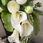Calla Lily,Eremurus and Ranunculus in an Asymmetric Ribbed Vase RTFact Flowers 