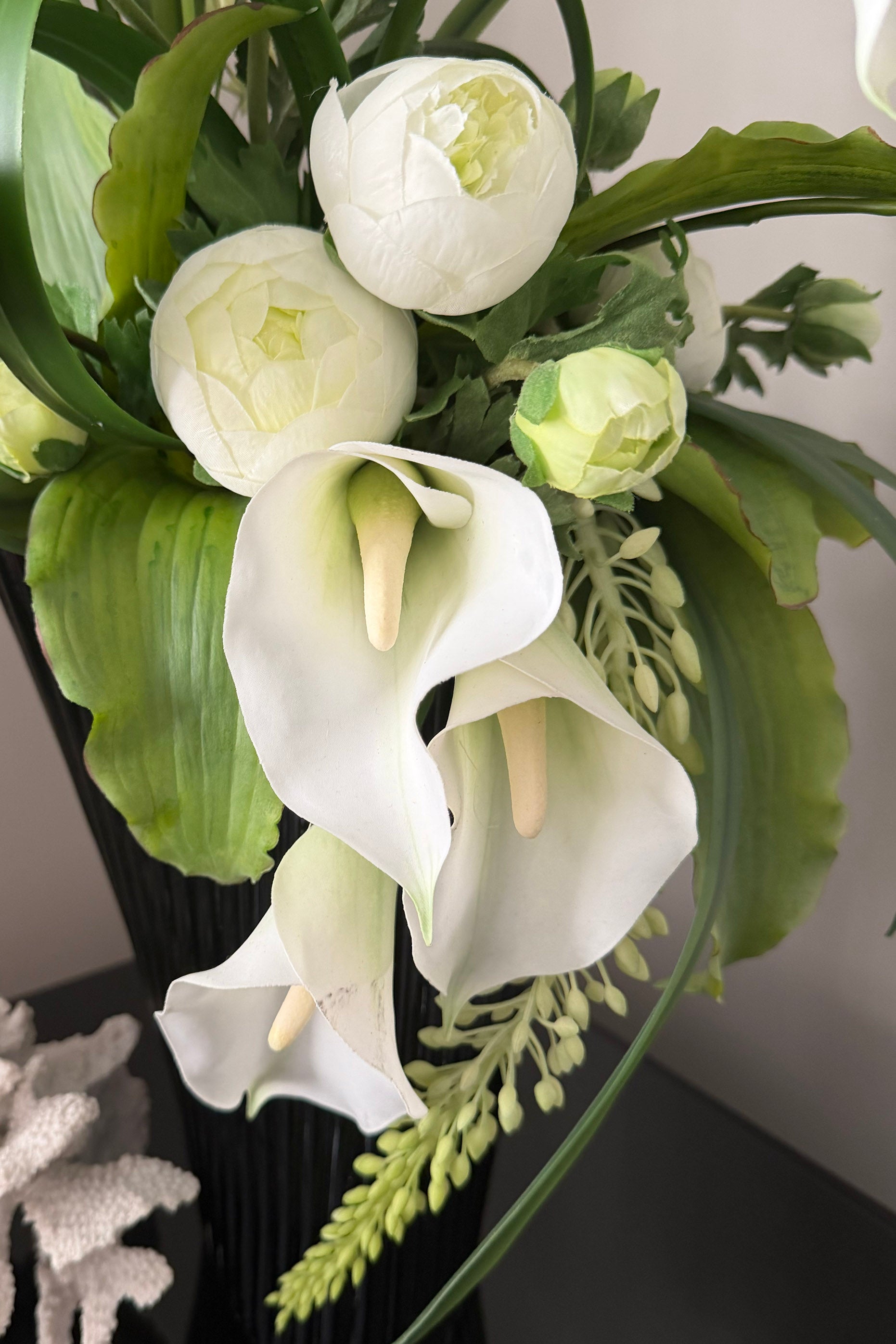 Calla Lily,Eremurus and Ranunculus in an Asymmetric Ribbed Vase RTFact Flowers 