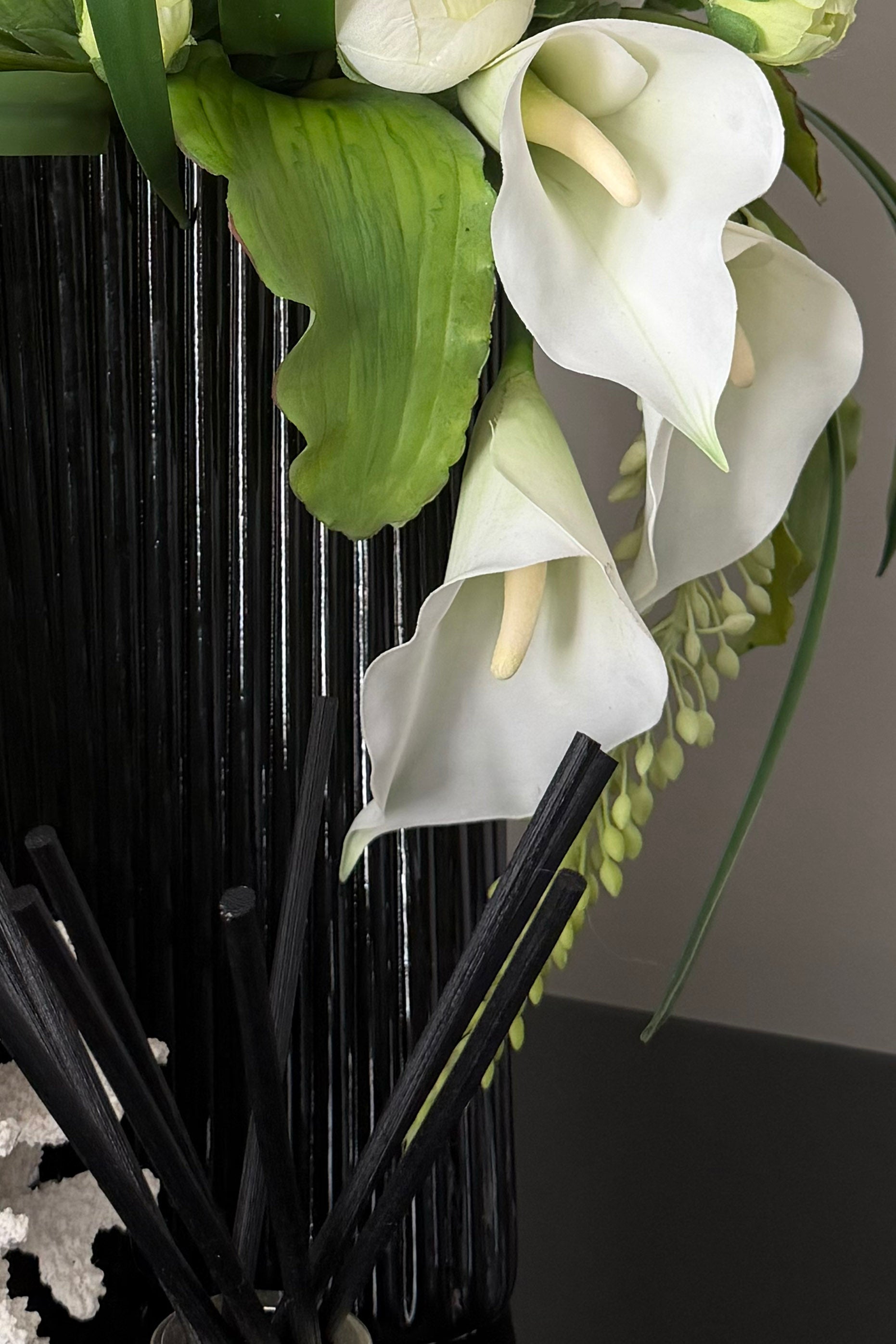 Calla Lily,Eremurus and Ranunculus in an Asymmetric Ribbed Vase RTFact Flowers 