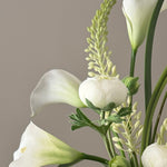 Calla Lily,Eremurus and Ranunculus in an Asymmetric Ribbed Vase RTFact Flowers 