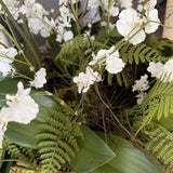 Dancing Orchids, Fern and Twigs in a Rattan Basket