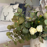 Hellebores, Eucalyptus, Roses and Hyacinth in a Stone Pot