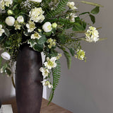 Ranunuculus, Hydrangea, Anemone and Astrantia in a Bronze Vase