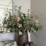 Eucalyptus, Astrantia and Twigs in a Bronze Textured Vase