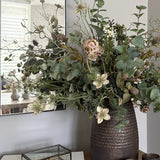 Eucalyptus, Astrantia and Twigs in a Bronze Textured Vase