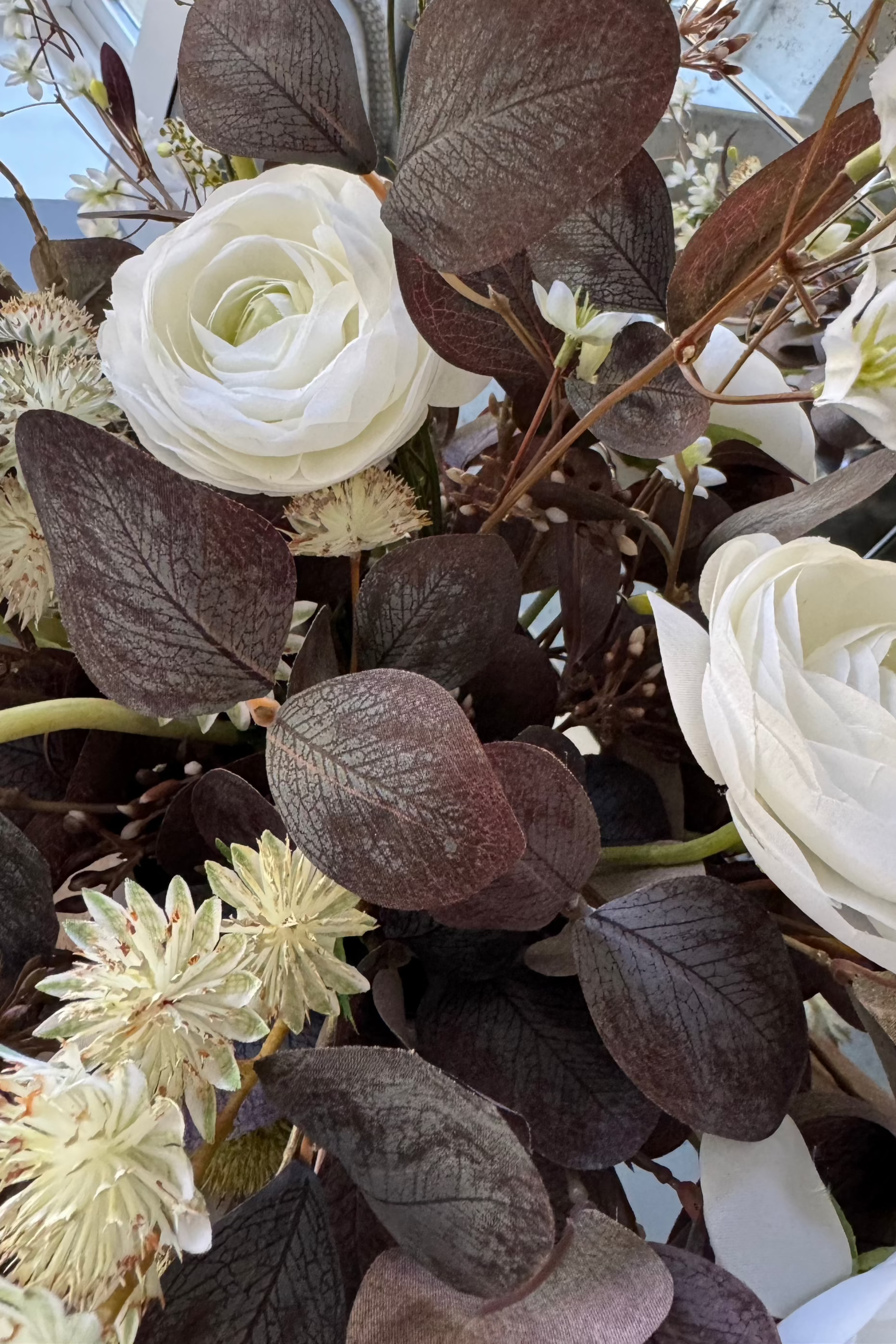 Ranunculus, Eucalyptus and Astrantia Spray in a Metallic Bronze Vase RTfact Flowers 