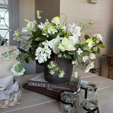 Hellebore, Bucida and Fern in a Dark Grey Stone Pot RTfact Flowers 
