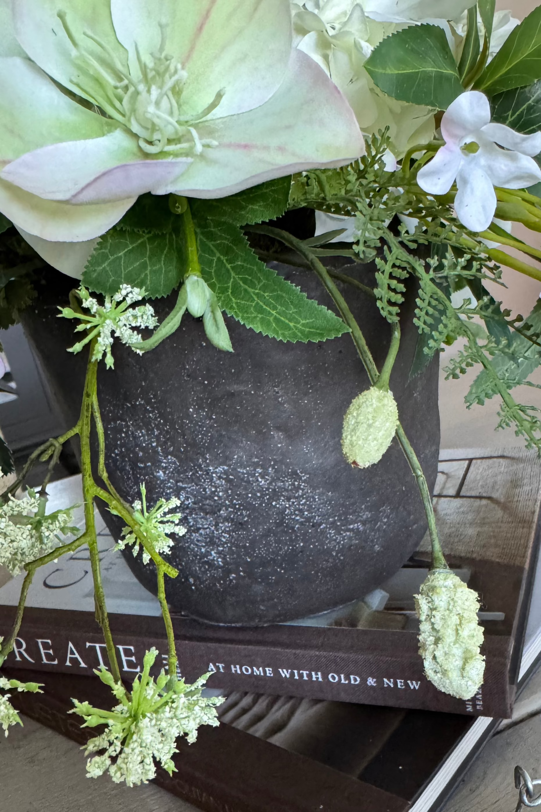 Hellebore, Bucida and Fern in a Dark Grey Stone Pot RTfact Flowers 