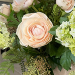 Ranunculus, Viburnum and Skimmia in a Taupe Glass Vase RTfact Flowers 