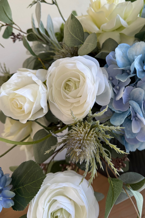 Rose, Ranunculus and Eucalyptus in a Grey Ridged Glass Vase
