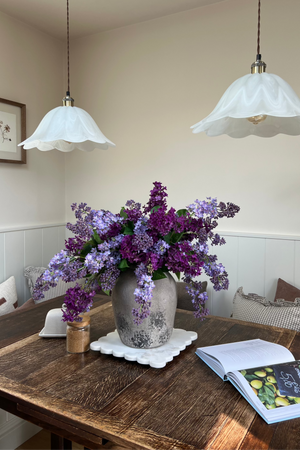 Lilac in a Textured Stone Effect Vase