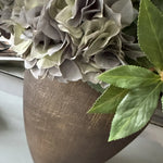 Ranunculus, Roses, Bucida and Eucalyptus in a Textured Bronze Vase RTfact Flowers 