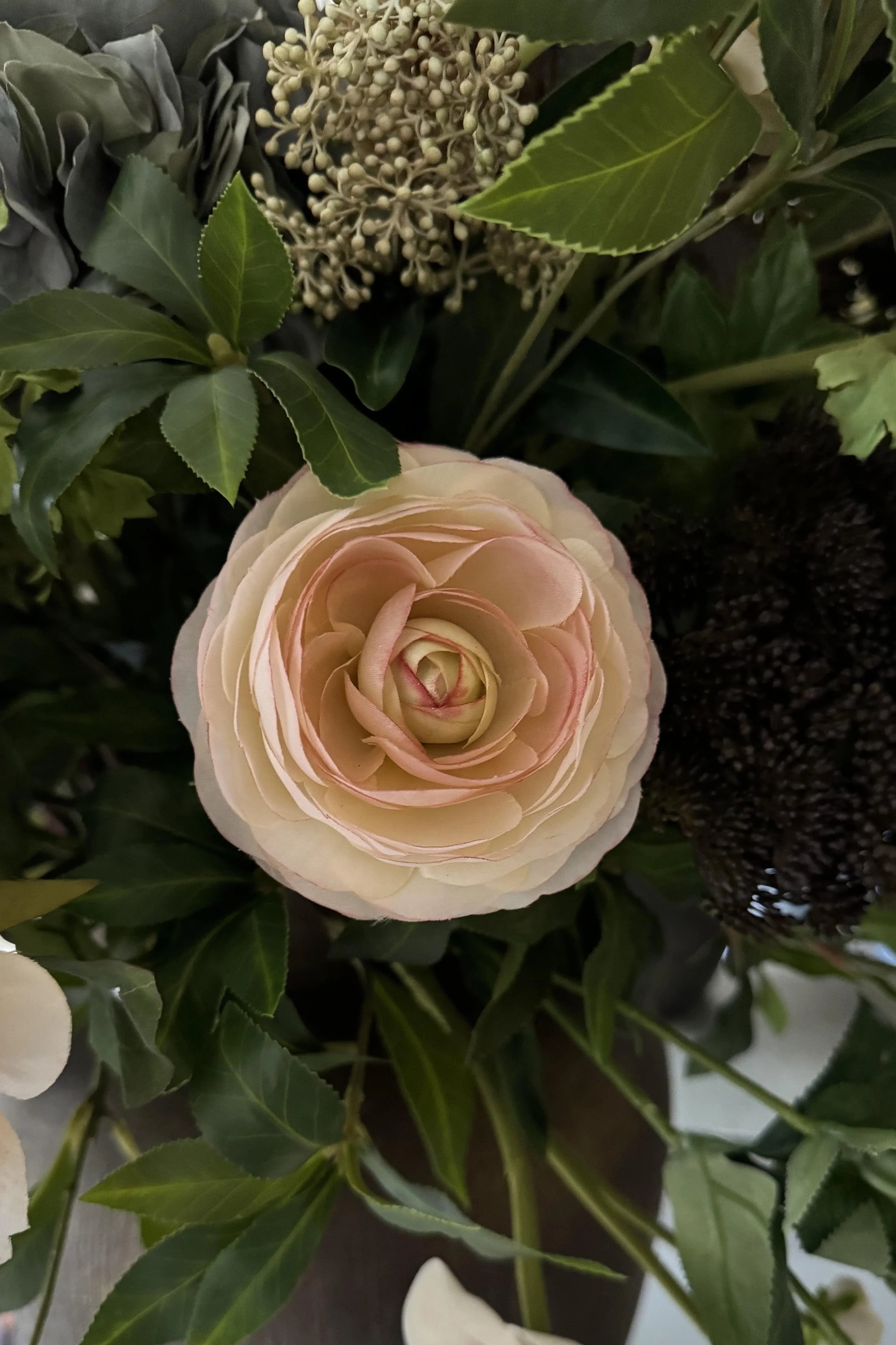 Ranunculus, Roses, Bucida and Eucalyptus in a Textured Bronze Vase RTfact Flowers 