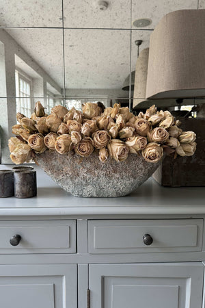 Roses in a Hand Painted Stone Boat