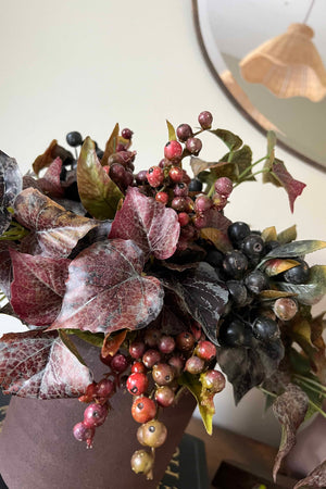 Berries and Ivy in a Dark Brown Clay Pot