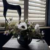 Anemone, Thistle and Eucalyptus in a Blue/Grey Glass Vase