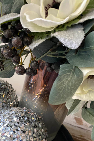 Anemone, Eucalyptus, Berries and Baubles in a Bronze/White Glass Vase