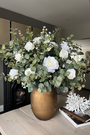 Eucalyptus and Roses in a Bronze Glass Vase