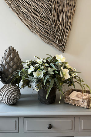 Eucalyptus, Hellebore, Wax Flower in a Matt Grey Stone Vase