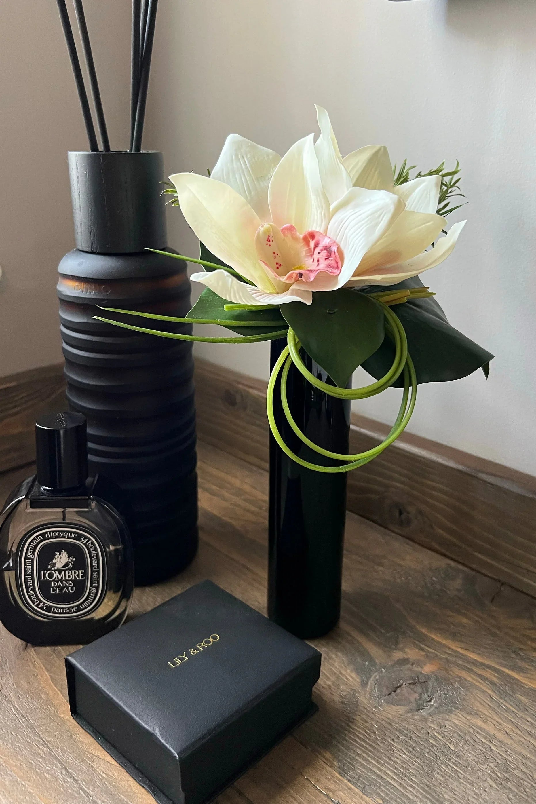 Cymbidium Orchid and Ivy Leaf in Black Glass Cylinder (Cream) RTfact Flowers 