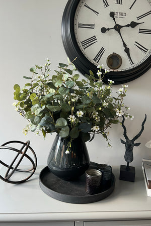 Eucalyptus and Waxflower in a Charcoal Grey Glass Vase