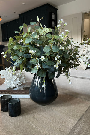Eucalyptus and Waxflower in a Charcoal Grey Glass Vase