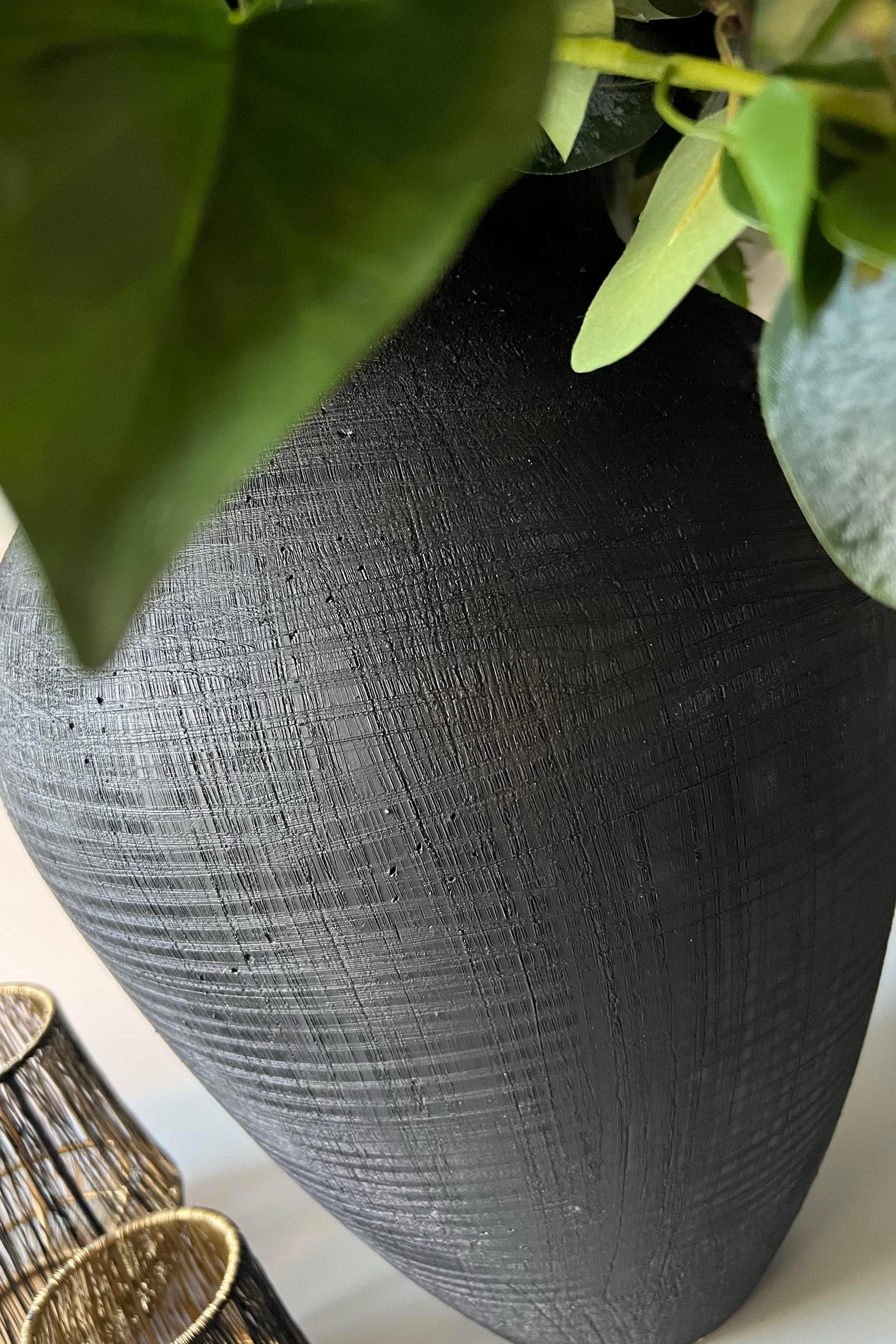 Eucalyptus, Hellebore, Hydrangea and Anemone in a Matt Black Vase RTfact Flowers 