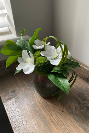 Vanda Orchid, Dianthus and Laurel in a Copper Vase