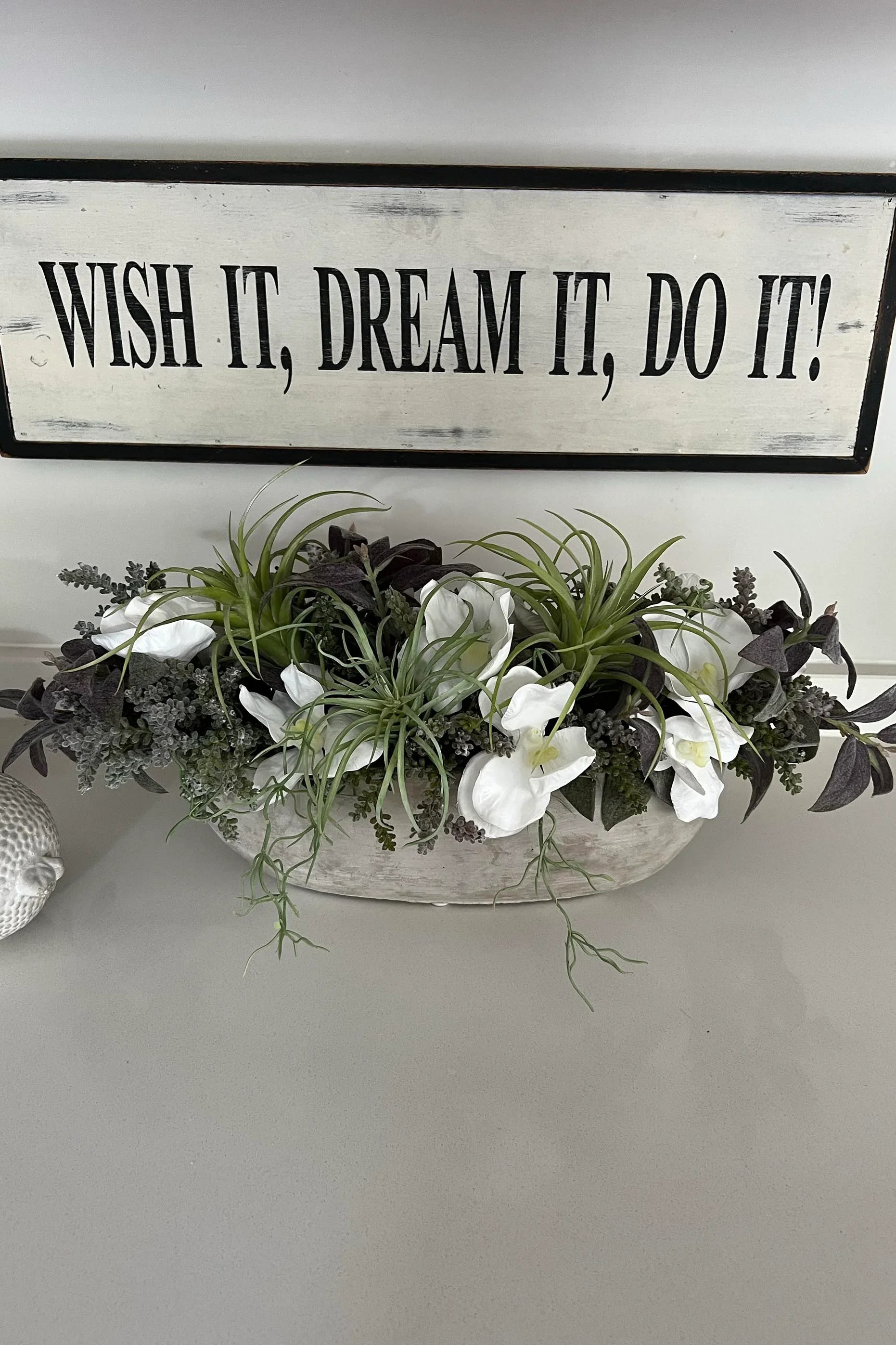 Orchids and Succulents in a Black Stone Boat RTfact Flowers 